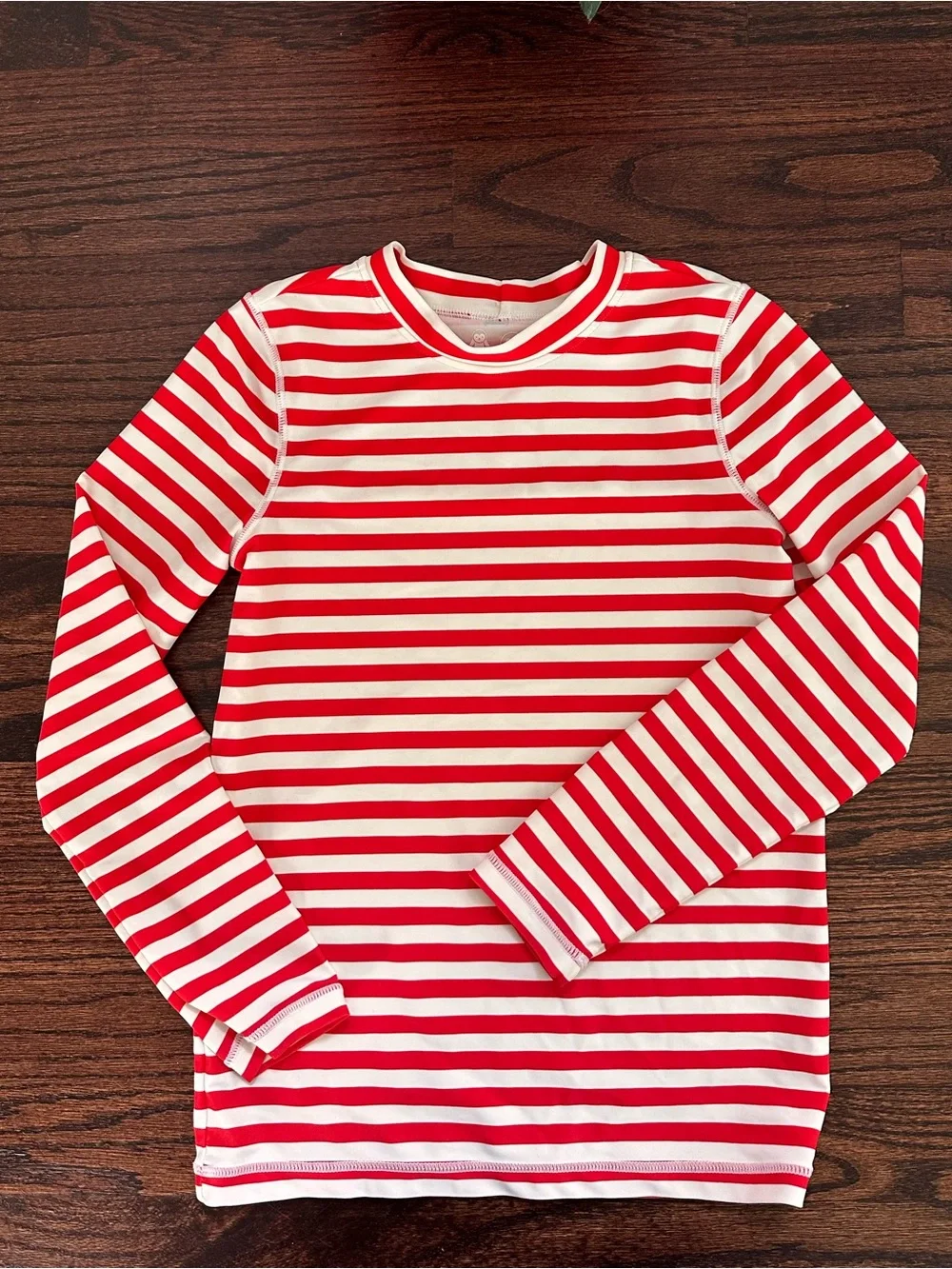 Primary long sleeve striped rash guard, size 8-9Y